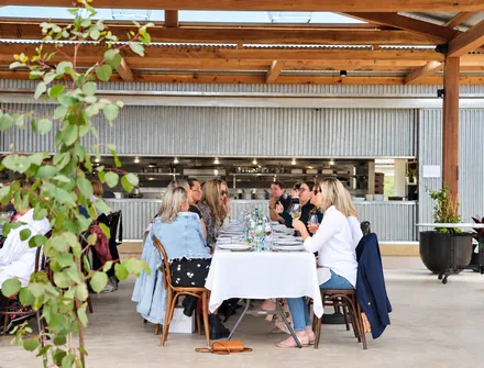 Riverside tables at golden hour